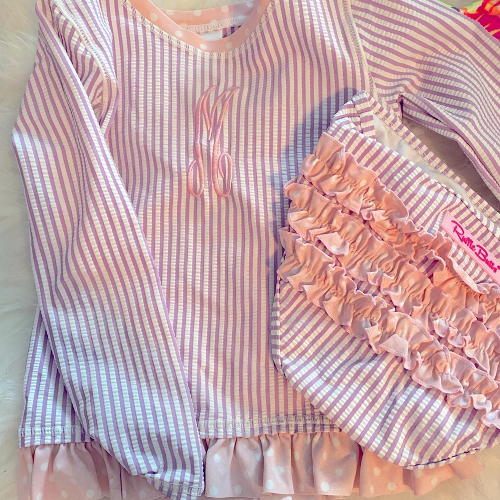 Rufflebutts Lavender Seersucker ruffle rash guard 2 piece